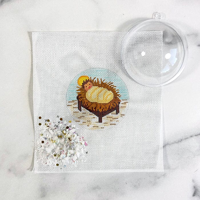 Baby Jesus Ornament with Clear Dome & Confetti Painted Canvas Kate Dickerson Needlepoint Collections 
